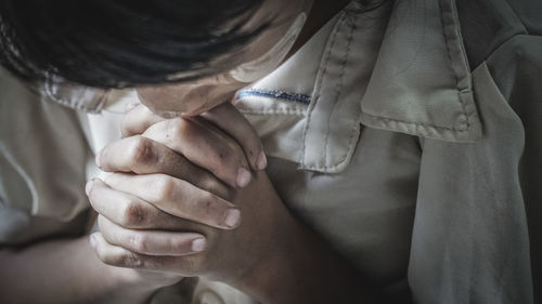 Close up of woman praying