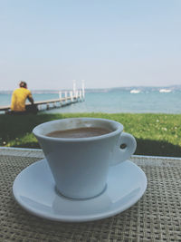 Close-up of coffee cup on table