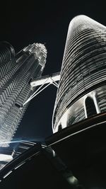 Low angle view of illuminated building at night