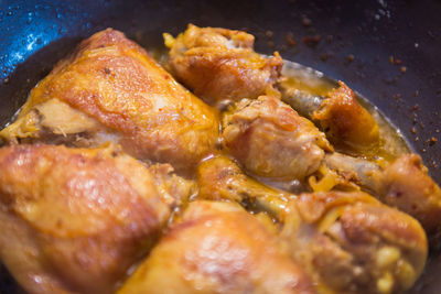 High angle view of meat in cooking pan
