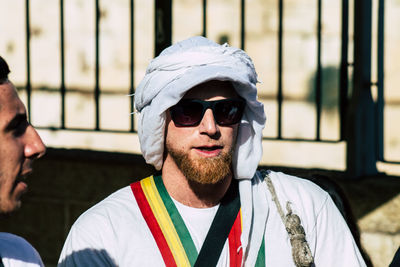 Portrait of young man wearing sunglasses