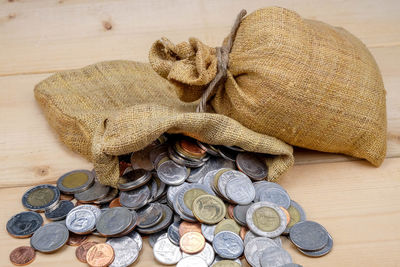 High angle view of coins on table