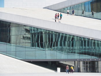 People walking in modern office building