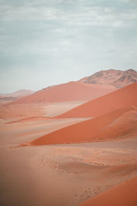 Scenic view of desert against sky