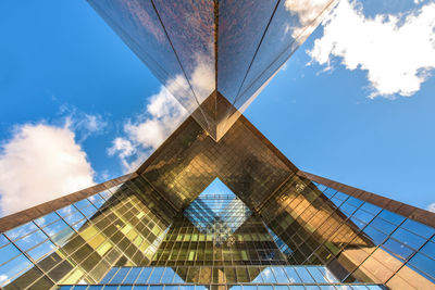 Low angle view of built structure against blue sky