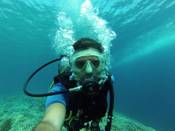 High angle view of person swimming in sea