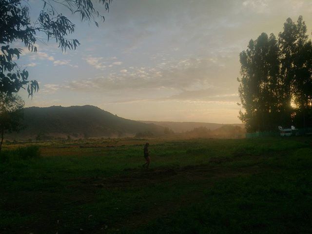 sky, landscape, tranquil scene, silhouette, tree, tranquility, scenics, mountain, beauty in nature, field, sunset, nature, grass, cloud - sky, leisure activity, cloud, lifestyles, non-urban scene