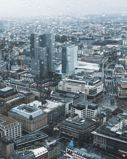 High angle view of modern buildings in city