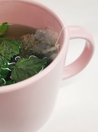 Close-up of tea cup on table