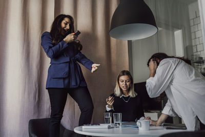 Happy female keyworkers at work