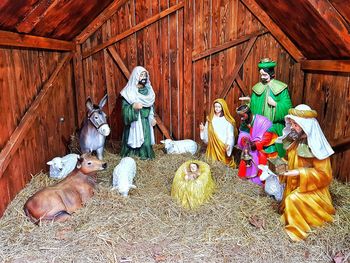 Female sculpture against wall