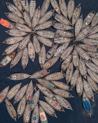 Aerial view of wooden passenger boats along the buriganga river, keraniganj, dhaka, bangladesh