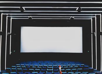 Low angle view of empty seats in building