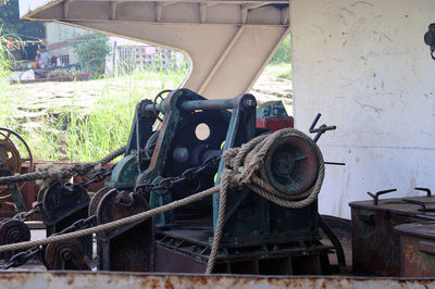 Close-up of rusty machine in car