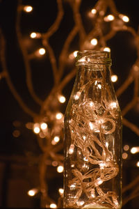 Close-up of illuminated light bulb