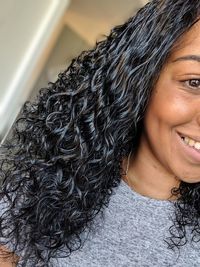 Close-up portrait of a smiling young woman