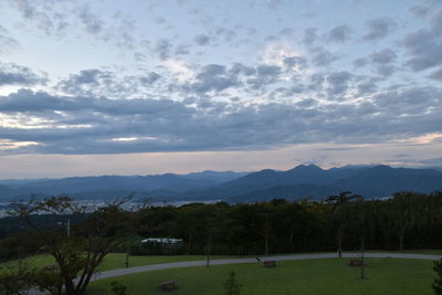 Scenic view of landscape against sky during sunset