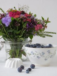 Close-up of flowers in vase on table