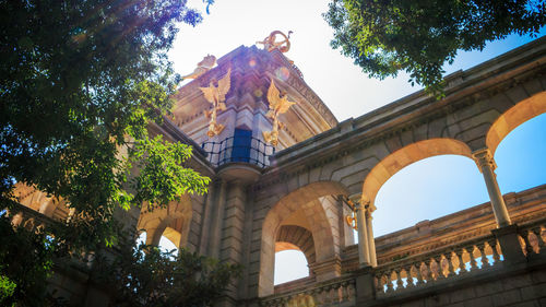 Low angle view of historic building against sky