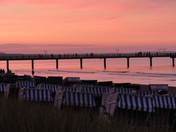 Scenic view of beach against sky during sunset