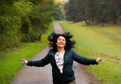 Portrait of happy woman outdoors