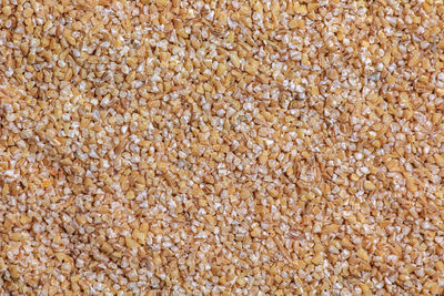 Background of raw wheat groats. texture. flat lay. healthy food concept.
