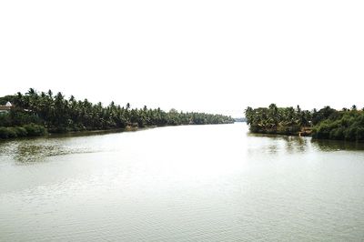 Scenic view of calm lake against clear sky