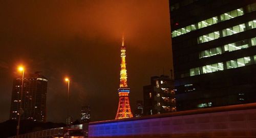 Low angle view of illuminated city at night