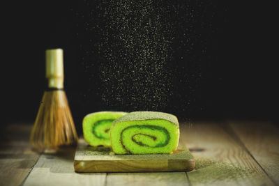 Close-up of bread on cutting board on table