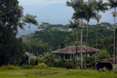 Built structure on landscape against sky