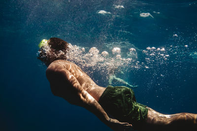 Man swimming underwater