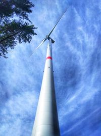 Low angle view of windmill against sky