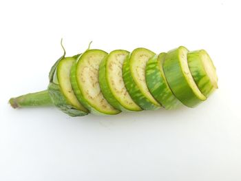 Close-up of bananas against white background