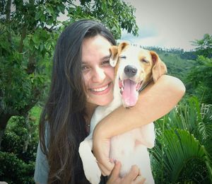 Portrait of woman with dog