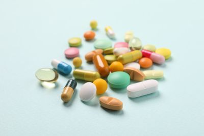 Close-up of pills on white background