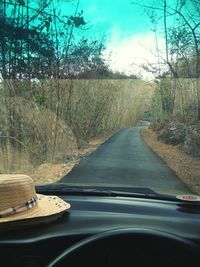 Road seen through car windshield