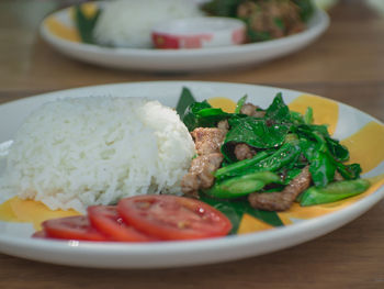 Close-up of salad in plate on table