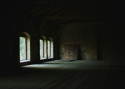 Arch windows in abandoned room