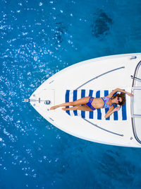 High angle view of sailboat sailing in sea