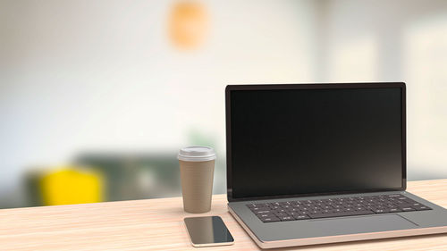 Close-up of laptop on table