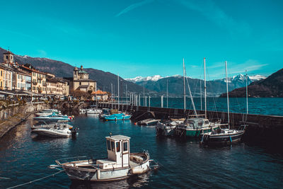 Boats moored at harbor