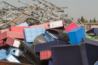 Pile of folders against sky