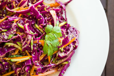 High angle view of purple served in plate on table