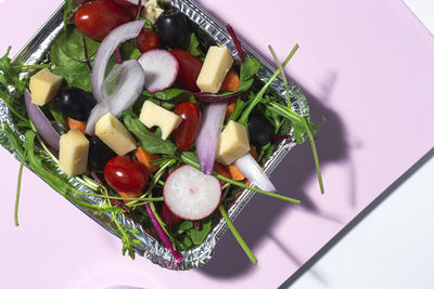 High angle view of chopped fruits in plate