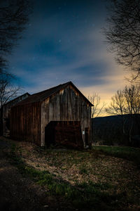 Abandoned barn against sky