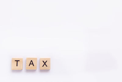 Tax text on white background