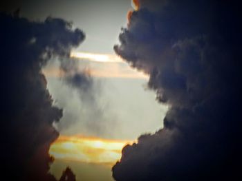 Scenic view of cloudy sky at dusk