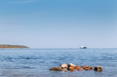 Scenic view of sea against clear sky