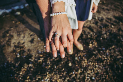 High angle view of woman hands