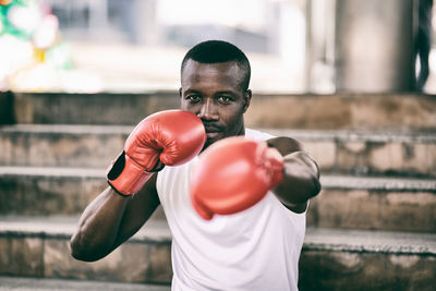 Portrait of man boxing 